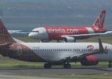 Pemerintah Malaysia Jajaki Pengalihan Pangsa Pasar Domestik AirAsia: Analisis Kritis